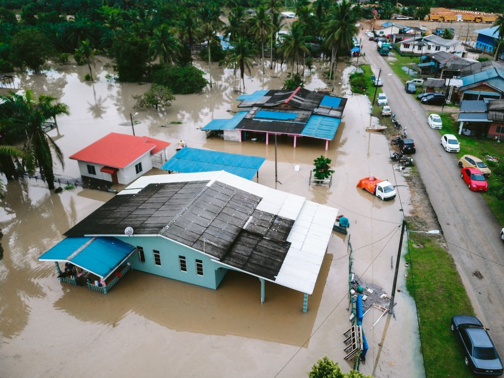 Aerial view of flooded homes and streets after heavy rain and flooding